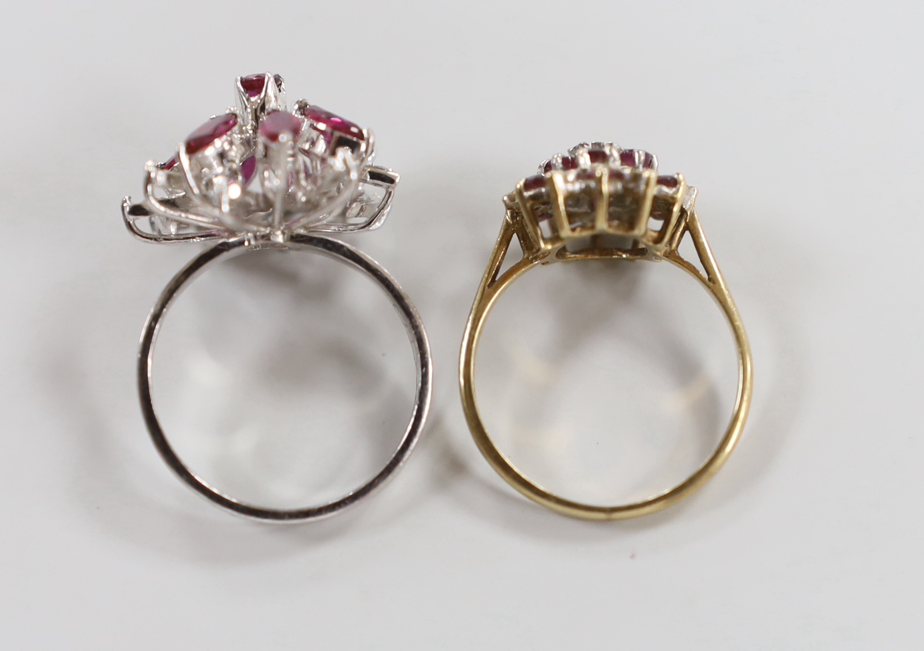 Two modern 9ct gold and gem set cluster dress rings including ruby and diamond, size N, gross weight 7.8 grams.